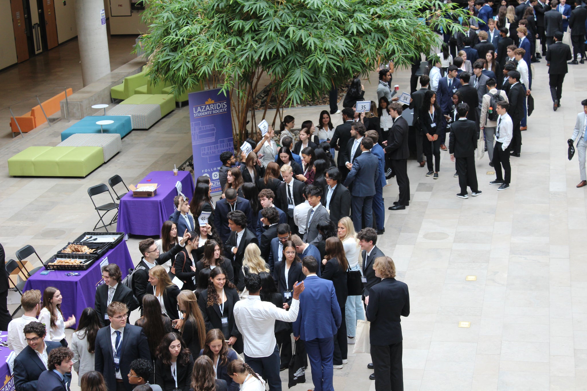 Image of first-year students networking in the Laz Atrium during O-Day 2023