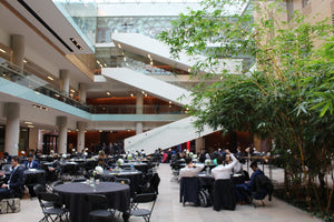 Inside of Laz Hall with tables in the center of the building 